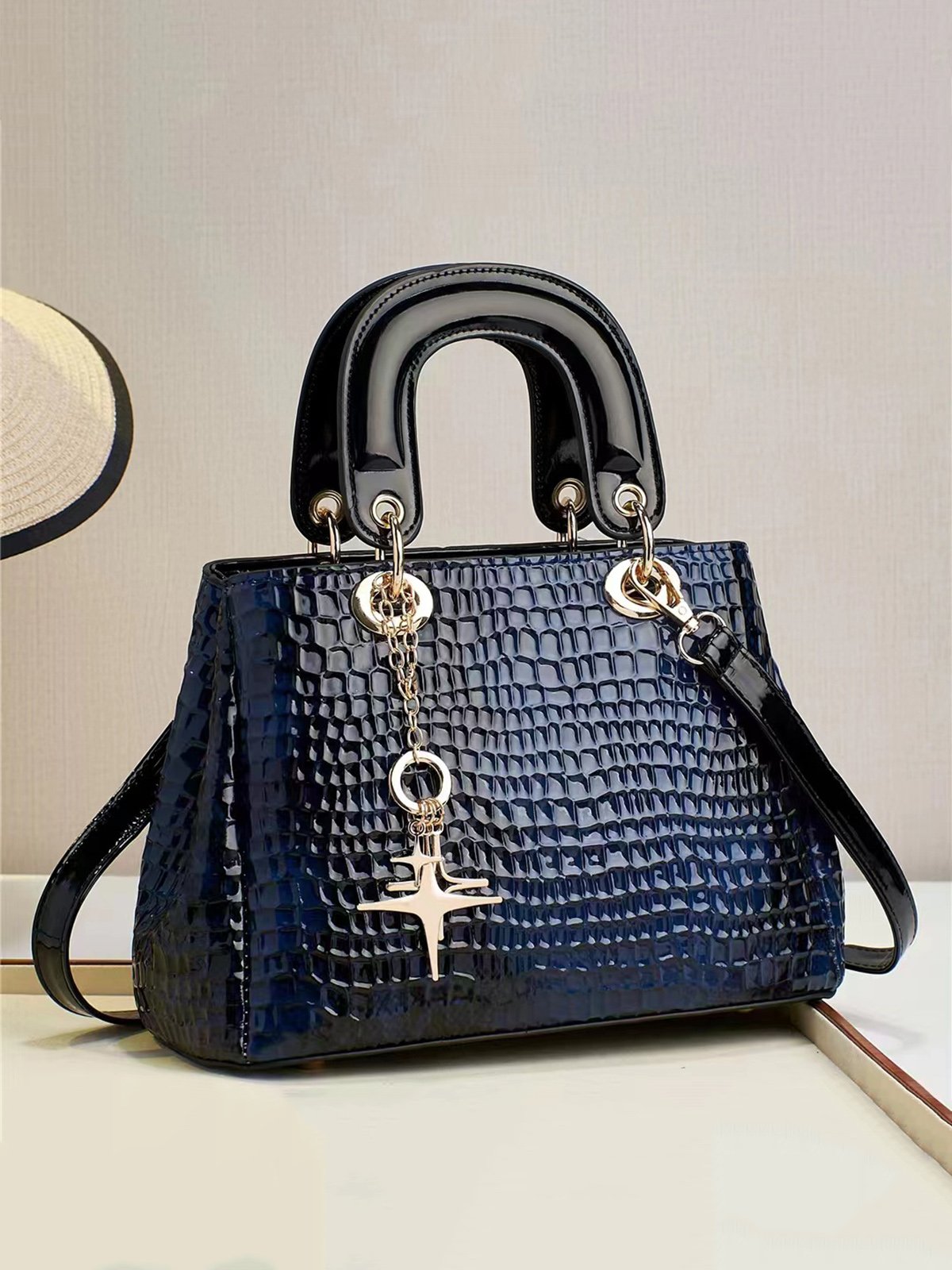 Snakeskin Embossed Meteor Metal Tassel Large-capacity Clutch Bag with Cross-body Strap