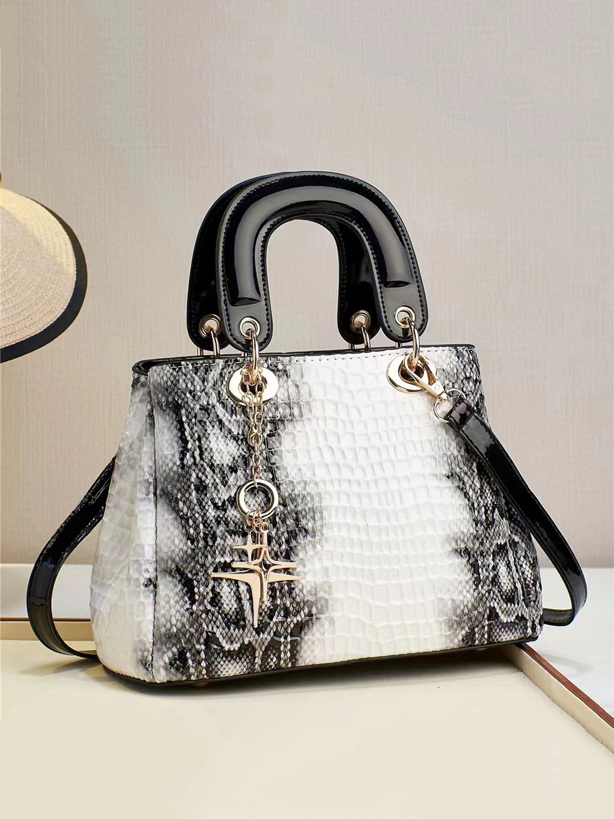 Snakeskin Embossed Meteor Metal Tassel Large-capacity Clutch Bag with Cross-body Strap