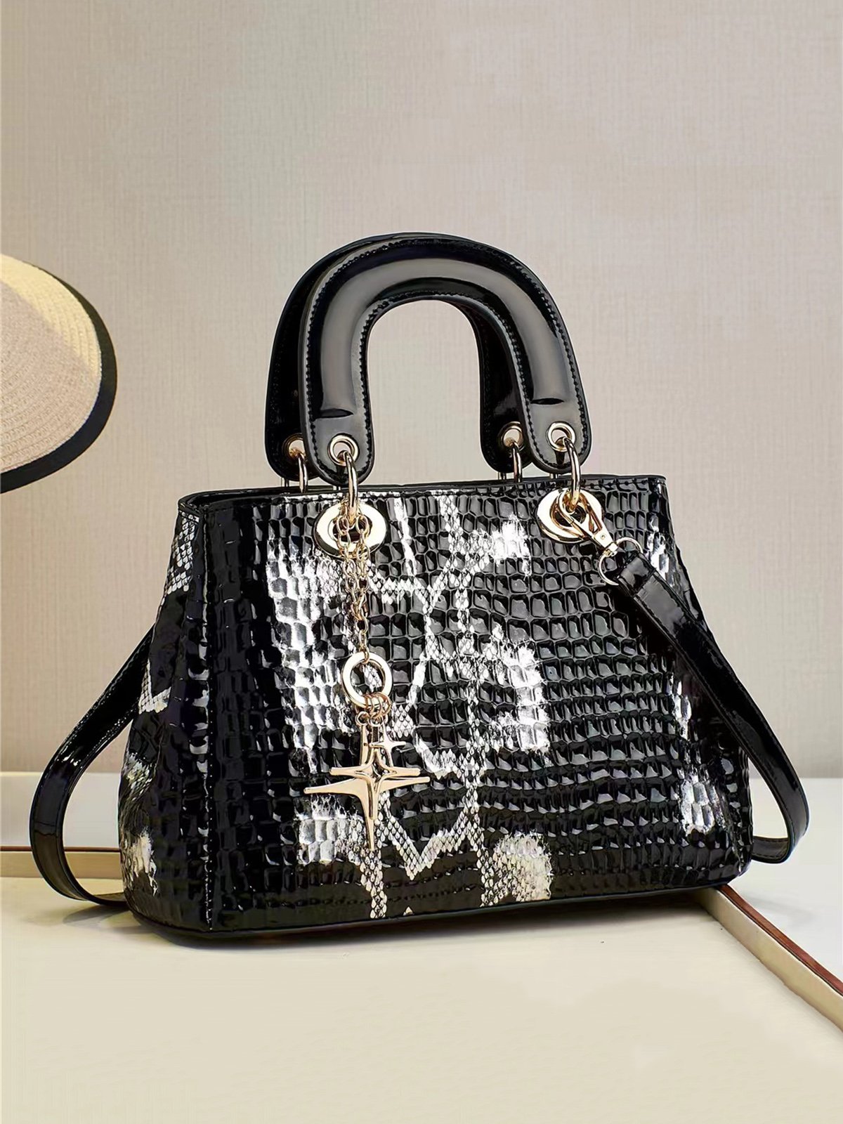 Snakeskin Embossed Meteor Metal Tassel Large-capacity Clutch Bag with Cross-body Strap