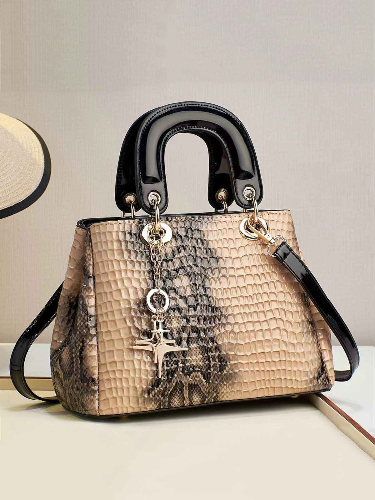 Snakeskin Embossed Meteor Metal Tassel Large-capacity Clutch Bag with Cross-body Strap