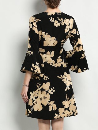black floral dress with bell sleeves