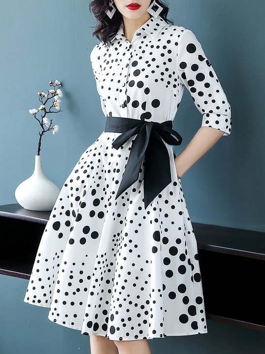 Would a white dress with small black polka dots be okay to wear as a guest?