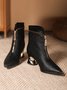 Black Embossed Front Zip Spool Heel Dress Boots